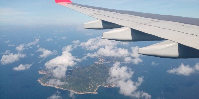 Aerial view of an island from an airplane window